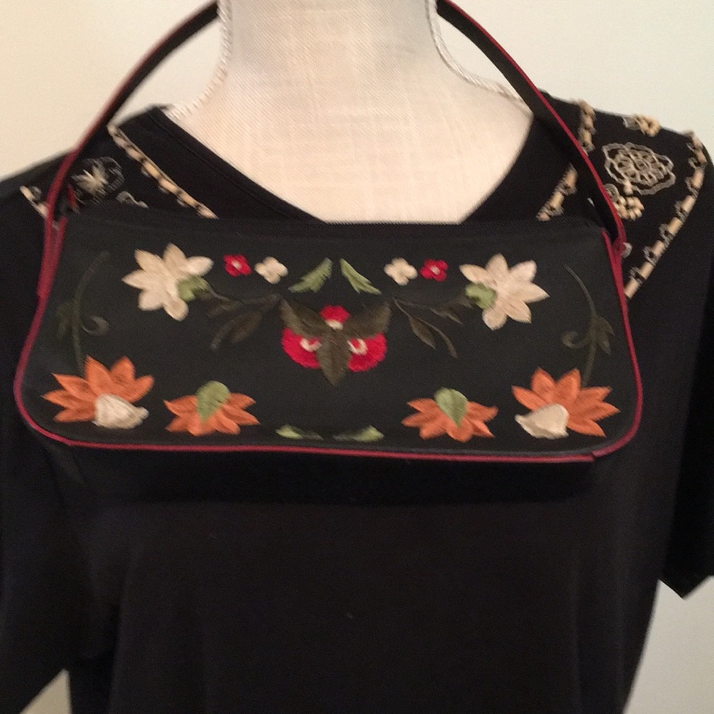 Black embroidered purse by Adrienne Vittadini